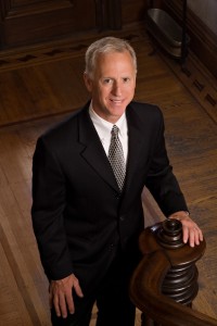 Smiling Man in a black suit